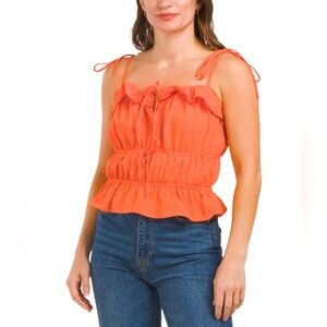 NWT! Sleeveless tie strap top. Available in M and L. Brand new with tags! ☀️